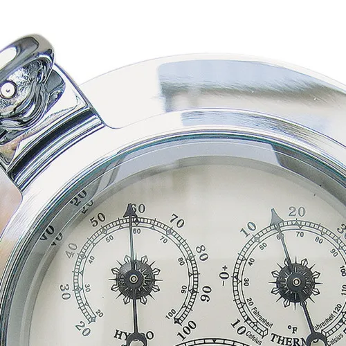 Uhr, Thermo- & Hygrometer im Bullauge – Detail der Oberfläche
