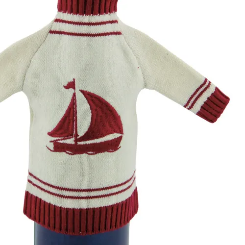 Flaschenpulli mit Mütze - Boot in Nahaufnahme