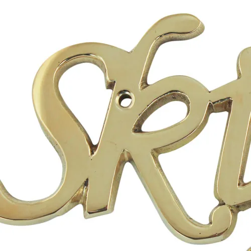 Detailansicht von Türschild Schrift Skipper
