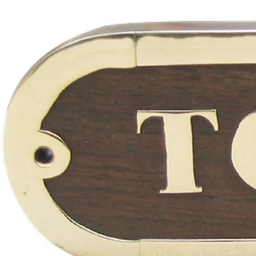 Detailansicht von Türschild TOILET