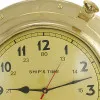 Uhr im Bullauge – Detail der Oberfläche